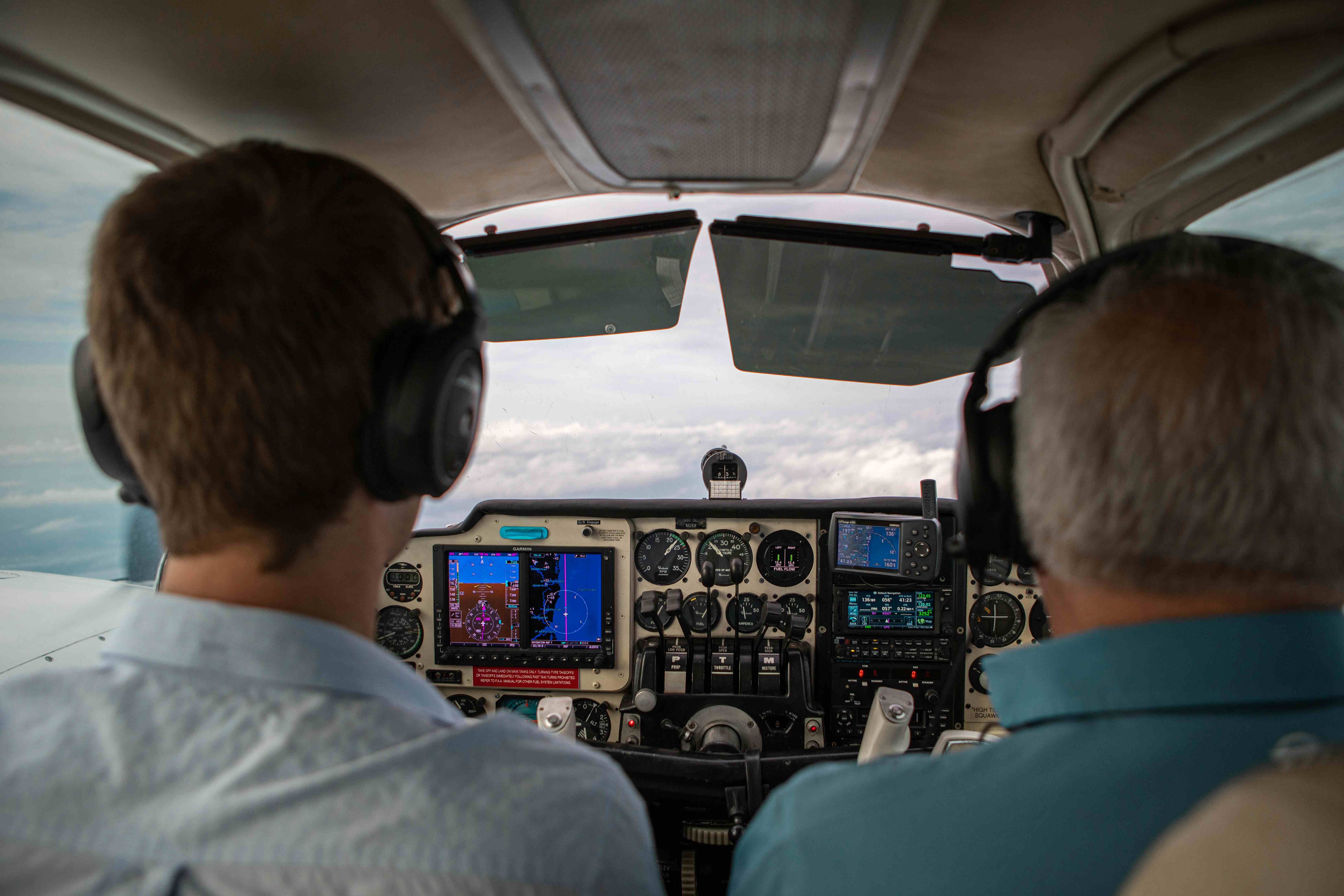 Pilots in a cockpit of a plane