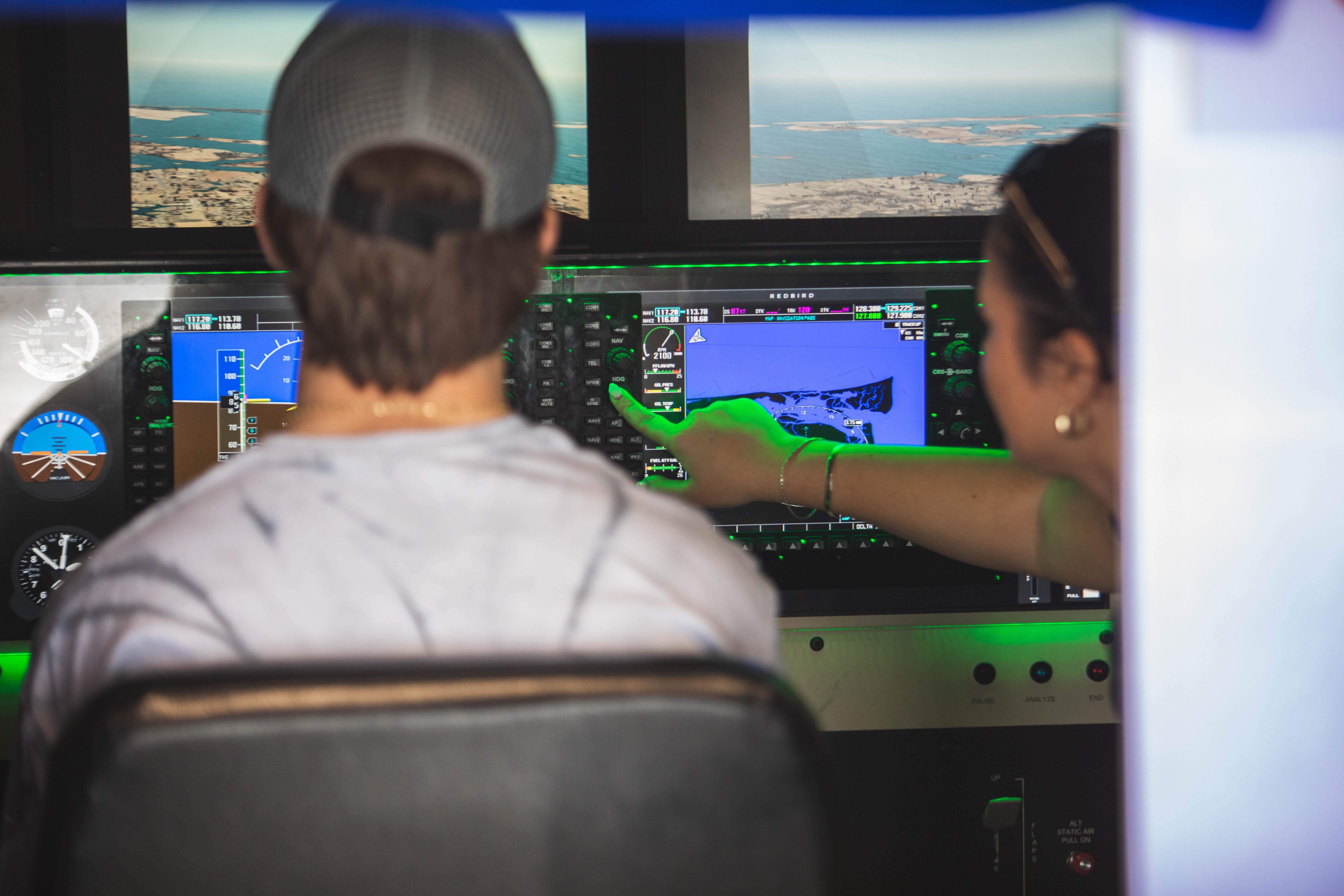 Student Trains with CFI at High Tide Aviation in Redbird FMX Simulator