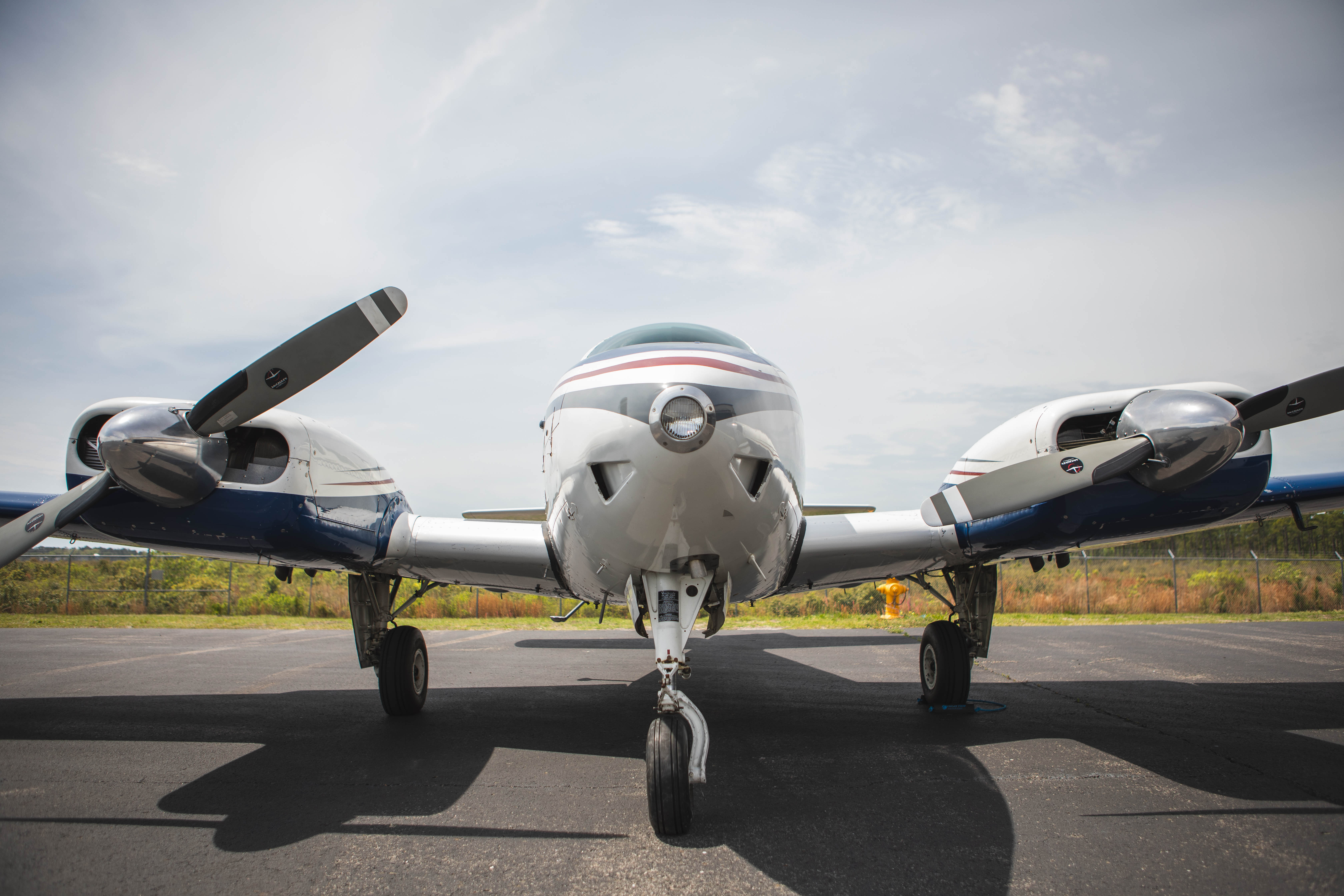 Front view of a Beechcraft B55 Baron on the ramp at High Tide Aviation