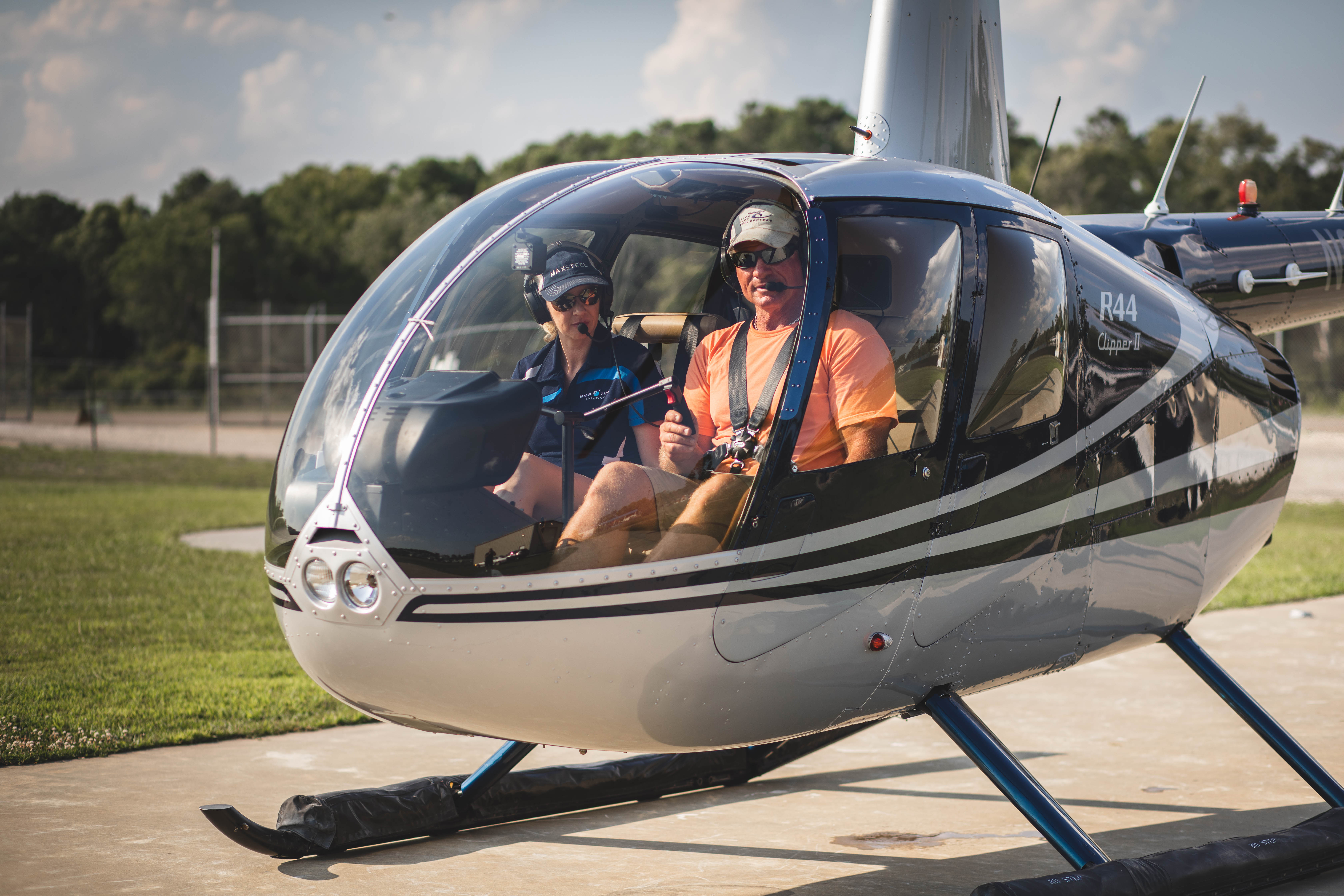 Advanced helicopter student reviewing training options in the Robinson R44